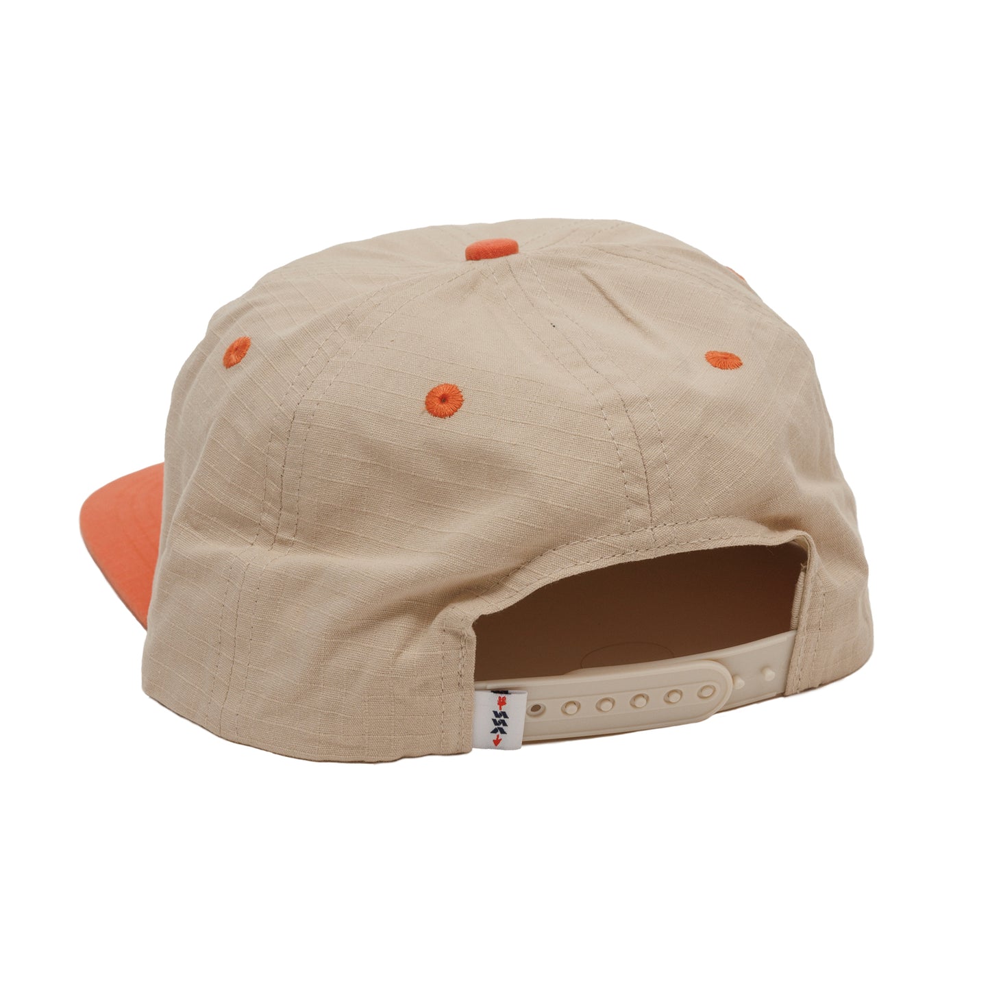 Back of Beige cap with orange accents with a snapback
