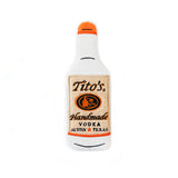Squeaky, floatable dog toy that looks like a Tito's bottle