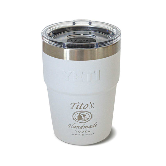 Front of white YETI Rambler® stackable cup with Tito's Handmade Vodka logo etched on