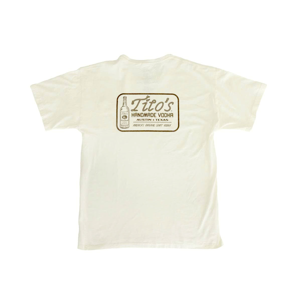 Back of cream short sleeve shirt with Tito's in rope outline on top of text "Handmade Vodka Austin, Texas" next to a Tito's bottle