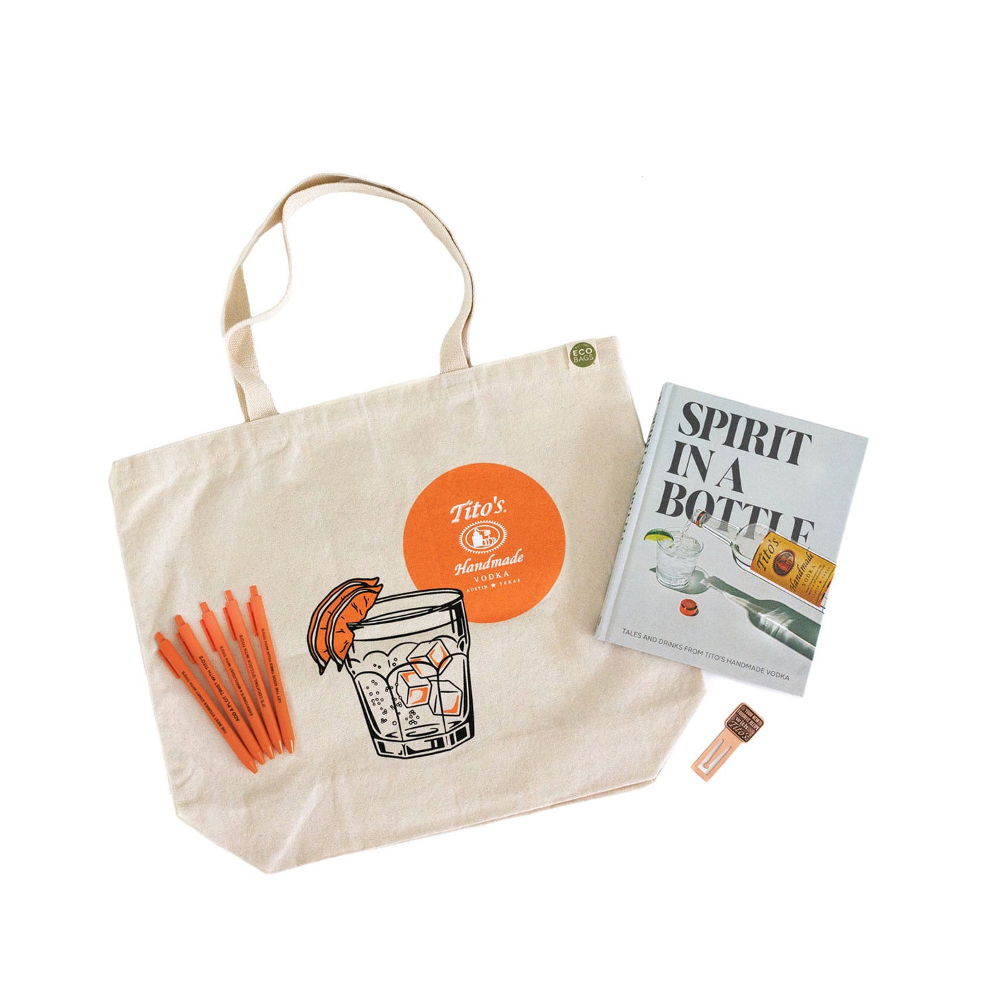 Tote bag, Spirit in a Bottle book, bookmark, and 5 orange pens