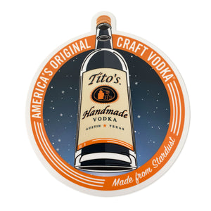 Round sticker with Tito’s Handmade Vodka bottle, stardust design, and orange ring with America’s Original Craft Vodka Made from Stardust