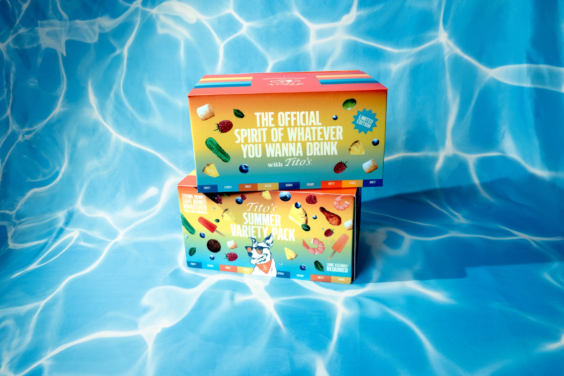 Two Tito's Summer Variety Pack boxes with colorful design and dog illustration, with a blue, pool-esque background