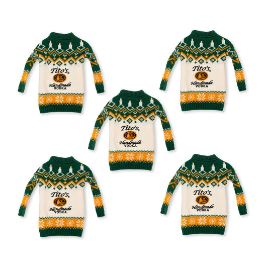 Five green and orange sweaters for vodka bottles with Tito's Handmade Vodka logo in the middle and festive designs 