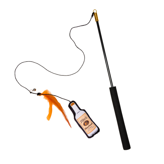 Black Cat toy wand with a plush bottle, bell, and feather attachment on the end