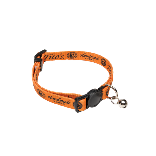 Orange cat collar with Tito's Handmade Vodka logo in black text with a bell buckled together
