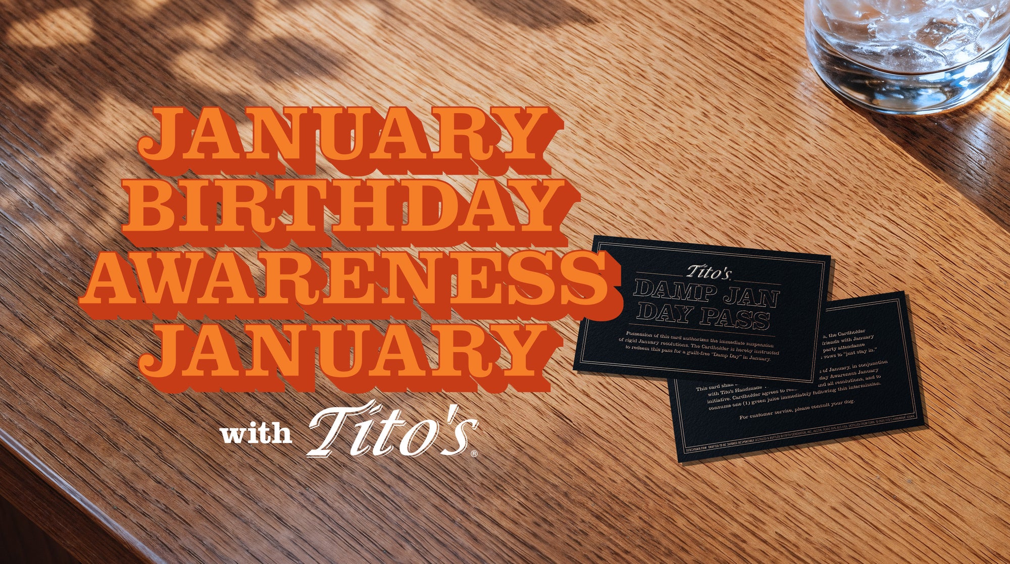 Tito's Damp Jan Day Pass cards on a bar top with the words "January Birthday Awareness January with Tito's