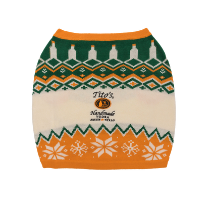 Back view of a patterned orange, white, and green dog sweater with a Tito's Handmade Vodka logo embroidered in the center