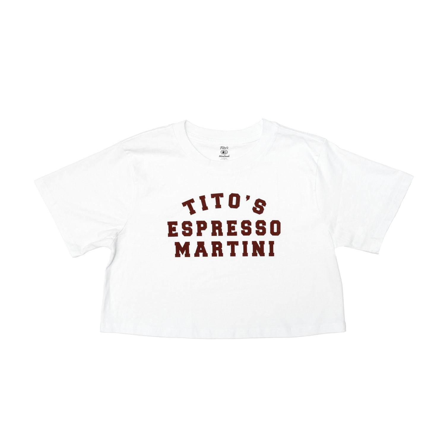 Front of white crop top with brown text saying "Tito's Espresso Martini"