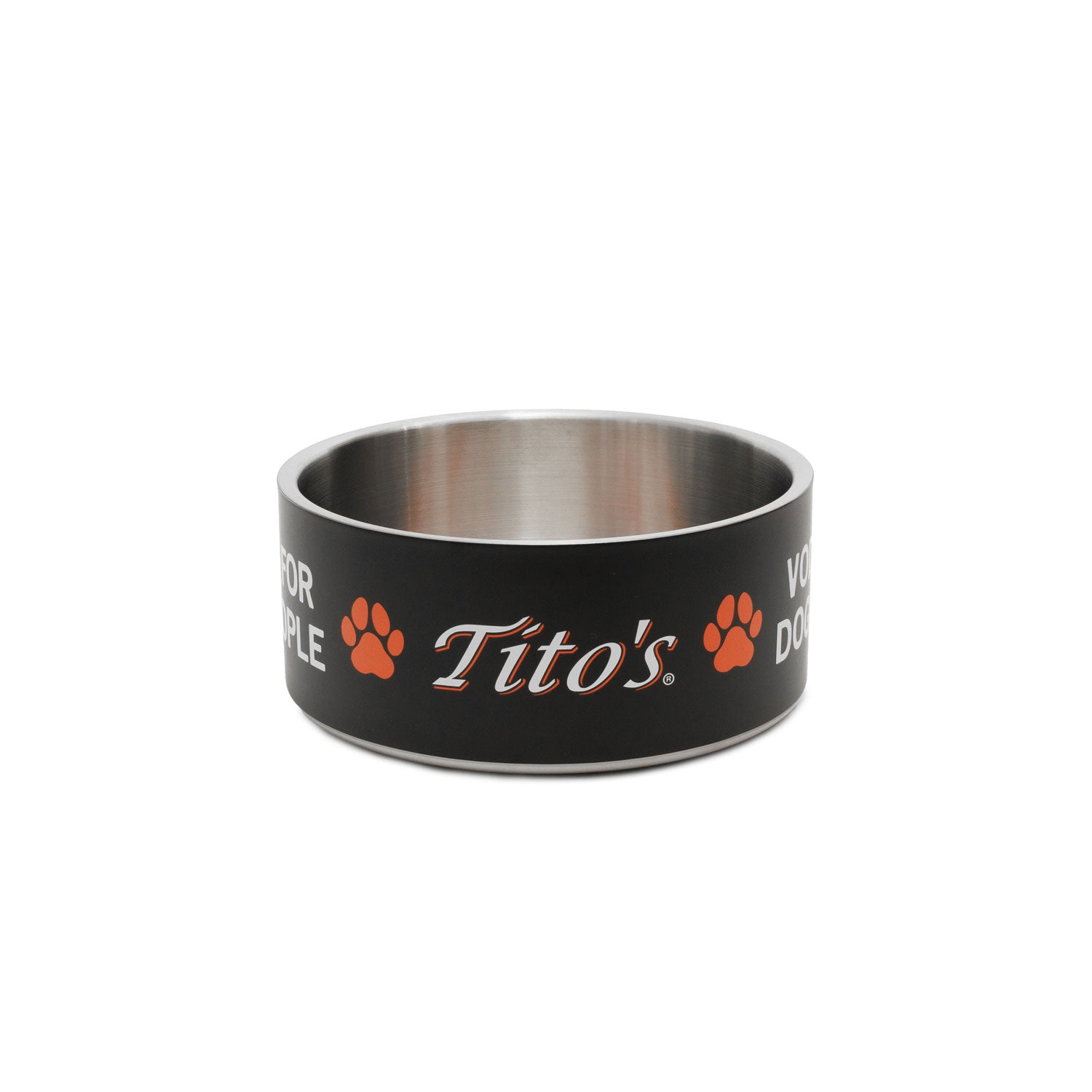 A black and stainless steel dog bowl featuring the orange and white 'Tito's' logo, Vodka for Dog People words, and paw prints on the exterior, set against a plain white background.