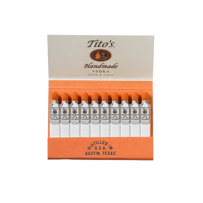Picture of an opened matchbook with the Tito's Handmade Vodka logo. The matches are white with the Tito's bottle printed on each one and the strike is orange. 