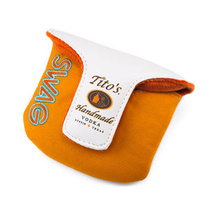Back of orange and white mallet cover with Tito's Handmade Vodka logo, SWAG Golf wordmark, and magnetic closure
