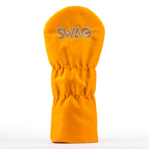 Back of orange driver cover with SWAG golf wordmark