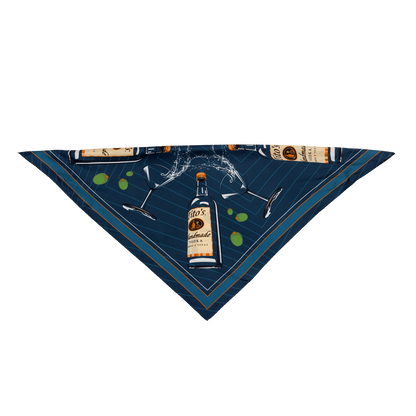 Blue silk scarf with a design of Tito's Handmade Vodka bottles and martini glasses overflowing with olives folded in half