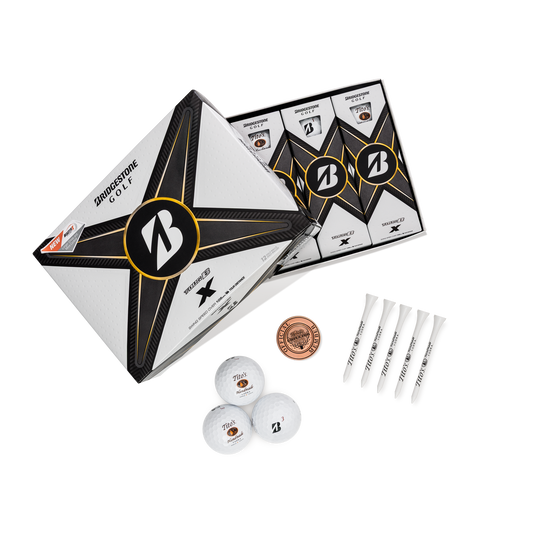 Box of Bridgestone golf balls with 3 golf balls. 5 white golf tees, and a Copper ball marker the says "Tito's Golf Club Official Member" 