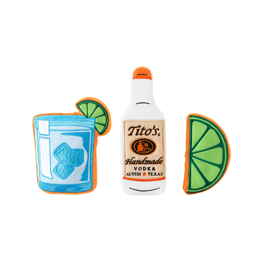 Front view of Tito's Bottle Toy with Tito's Handmade Vodka logo, Tito's Puptail squeeze toy, and Tito's Squeeze lime toy
