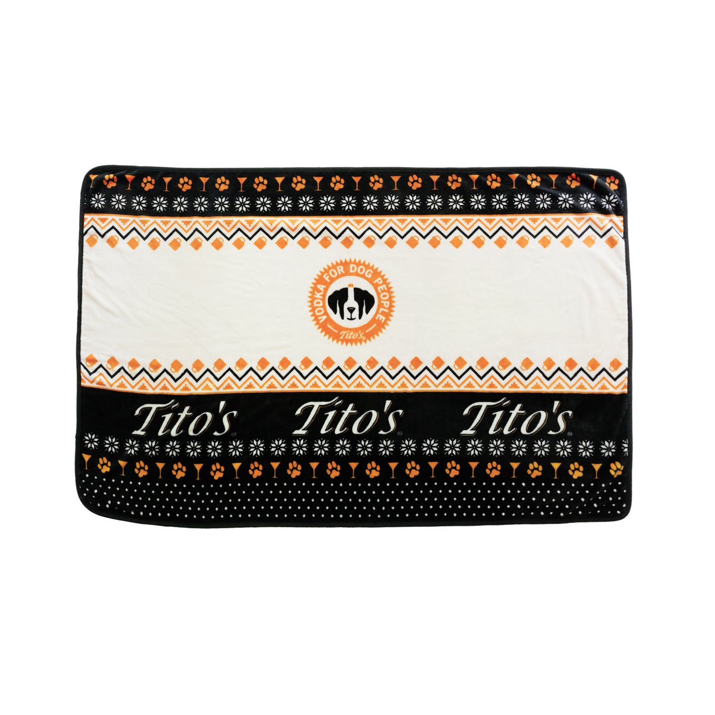 Black, orange, and white blanket with Vodka for Dog People logo, Tito's wordmark, and designs of martinis, snowflakes, and dog paws