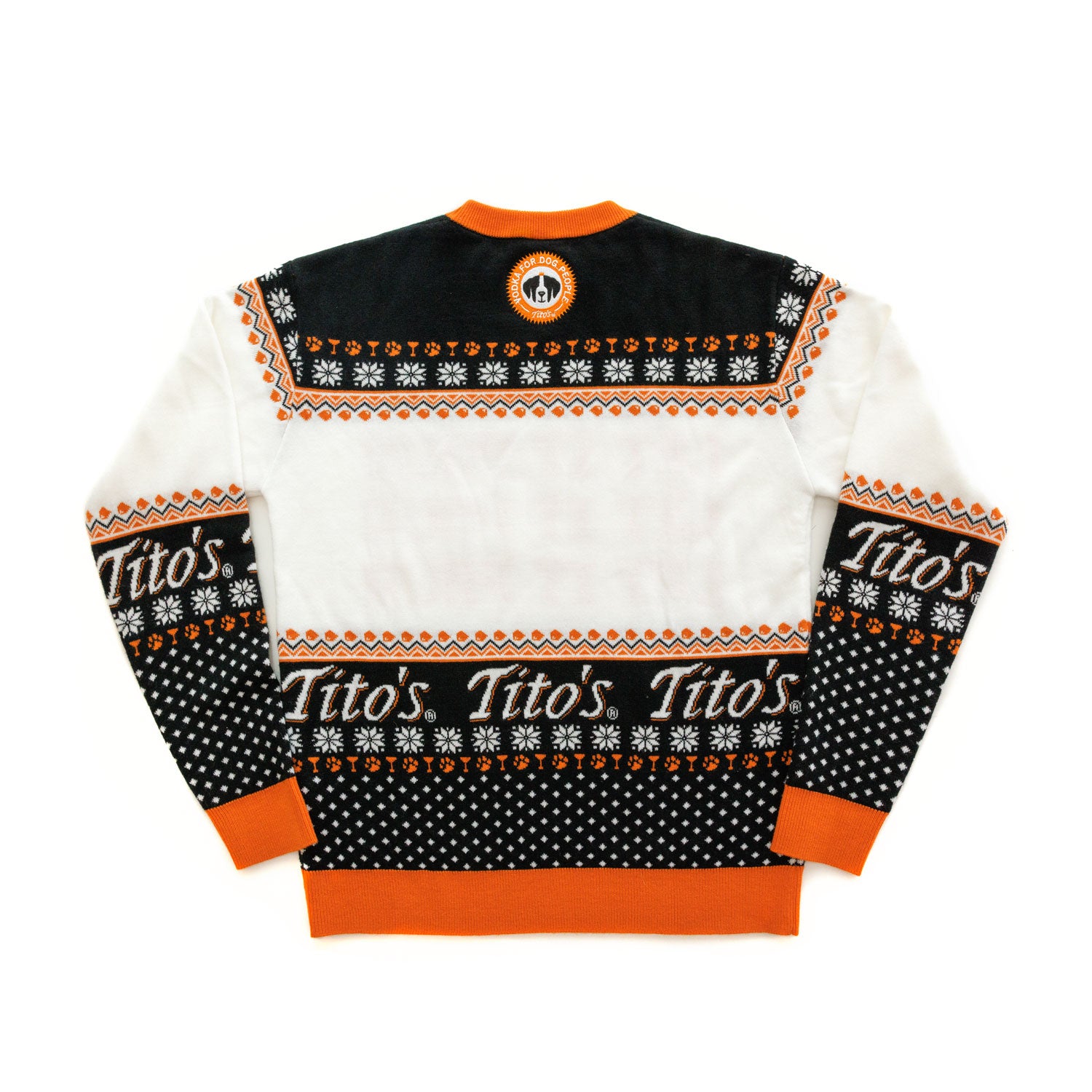 Back view of black, orange, and white pullover with snowflake designs, martinis, paw prints, Tito's wordmark, and Vodka for Dog People logo