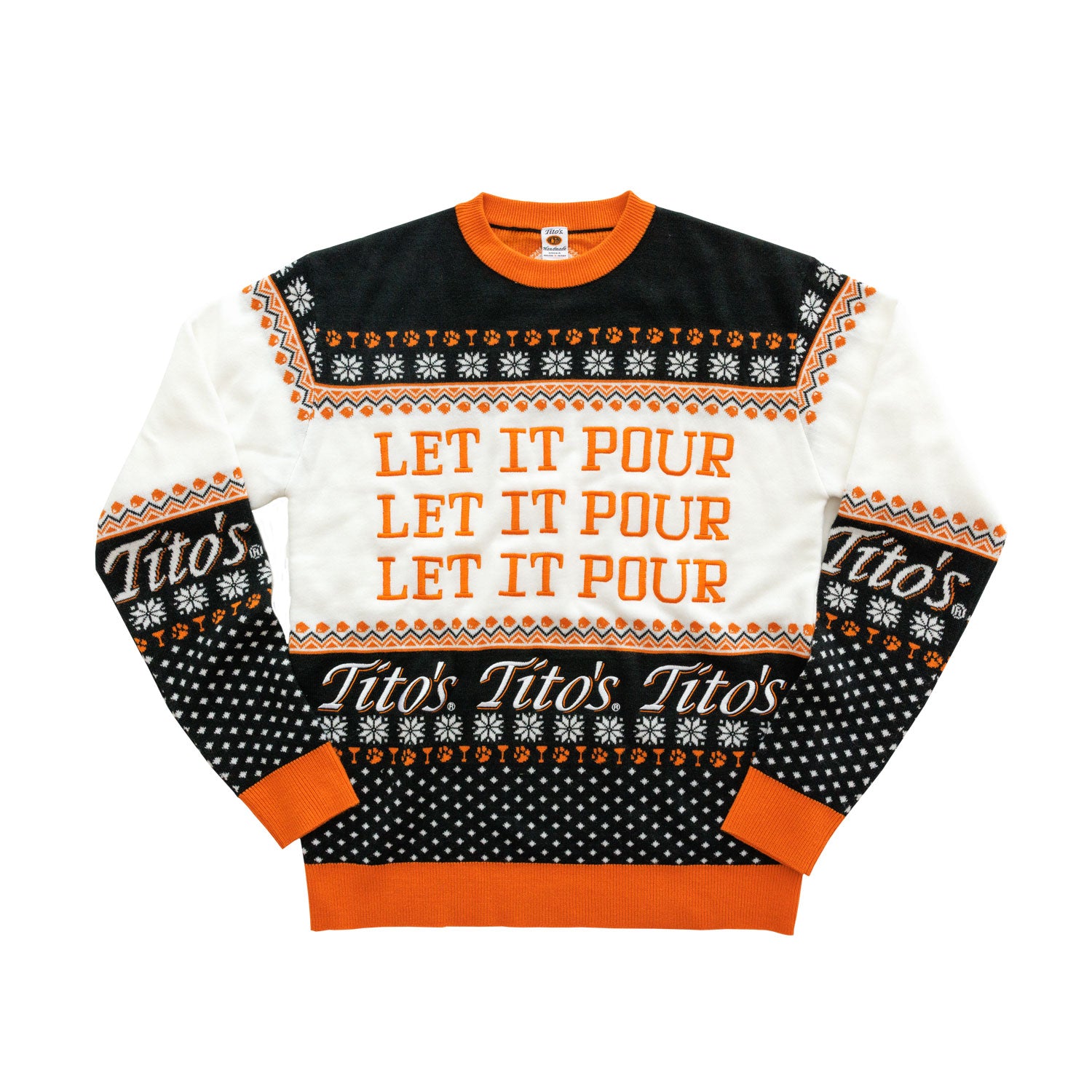 Front view of black, orange, and white pullover with snowflake designs, martinis, paw prints, Tito's wordmark, Let It Pour text