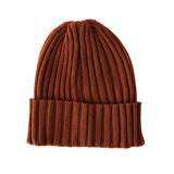 Back view of rust colored knit beanie with cuff