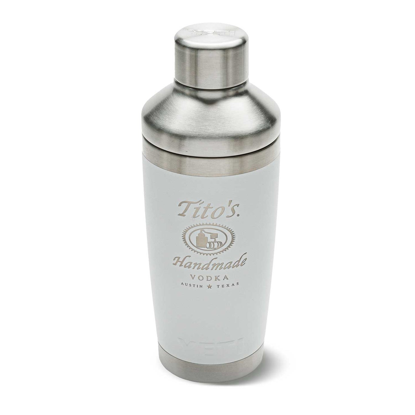 Front of white YETI Cocktail shaker with Tito's Handmade Vodka logo etched on and stainless steel cap