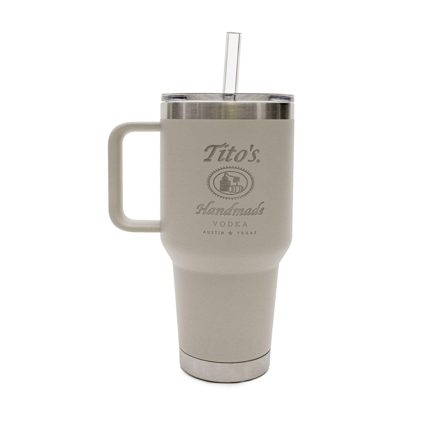 Taupe colored YETI Rambler 35 oz with handle and straw with the Tito's Handmade Vodka logo on the front of the cup