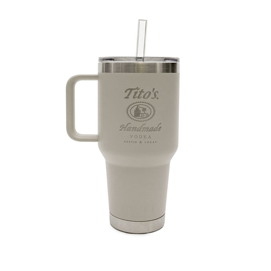 Taupe colored YETI Rambler 35 oz with handle and straw with the Tito's Handmade Vodka logo on the front of the cup