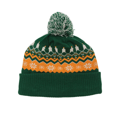Green knit beanie with pom poms with orange and white festive patterns