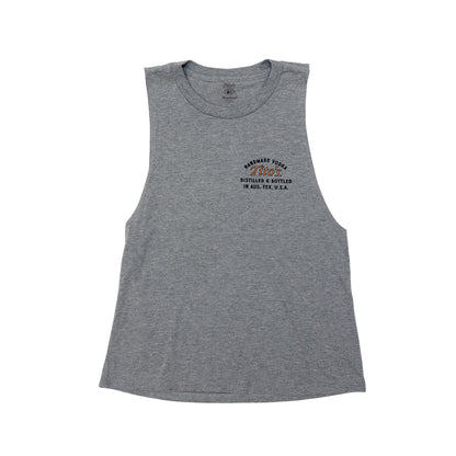 Front of heathered grey ladies tank top with a small Tito's logo on the left chest 