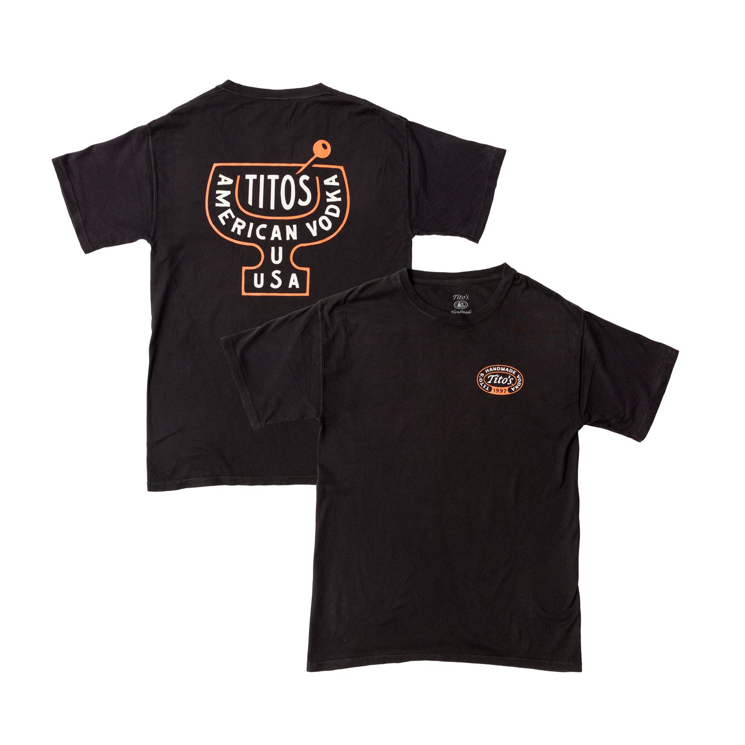Front and back view of a black shirt with orange and white lettering. Front shirt has a circle logo with Tito's in the center and Tito's Handmade Vodka 1997 around it. The back has a martini glass outline with Tito's American Vodka Aus USA text inside