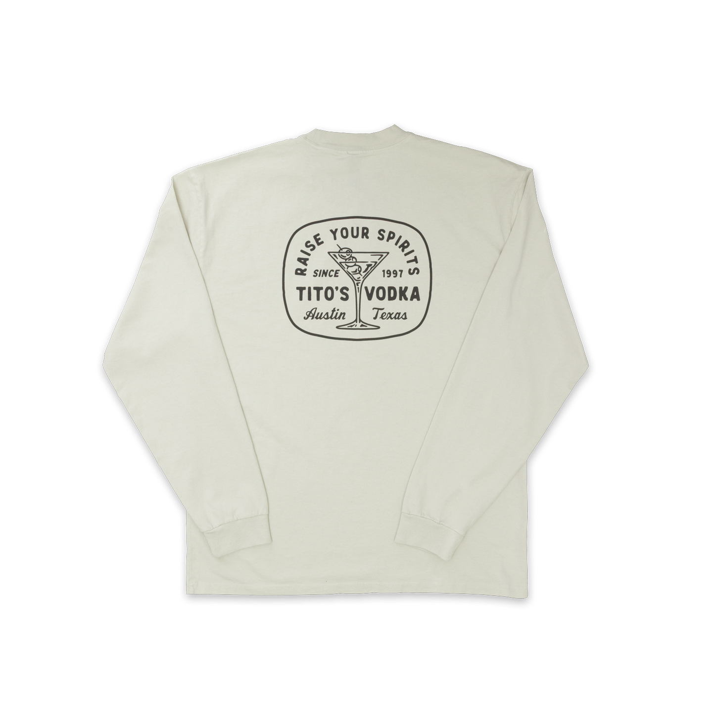 Back view of bone colored longsleeve with design of a martini glass with olives and says Raise Your Spirits, Tito's Vodka, Austin, Texas Since 1997