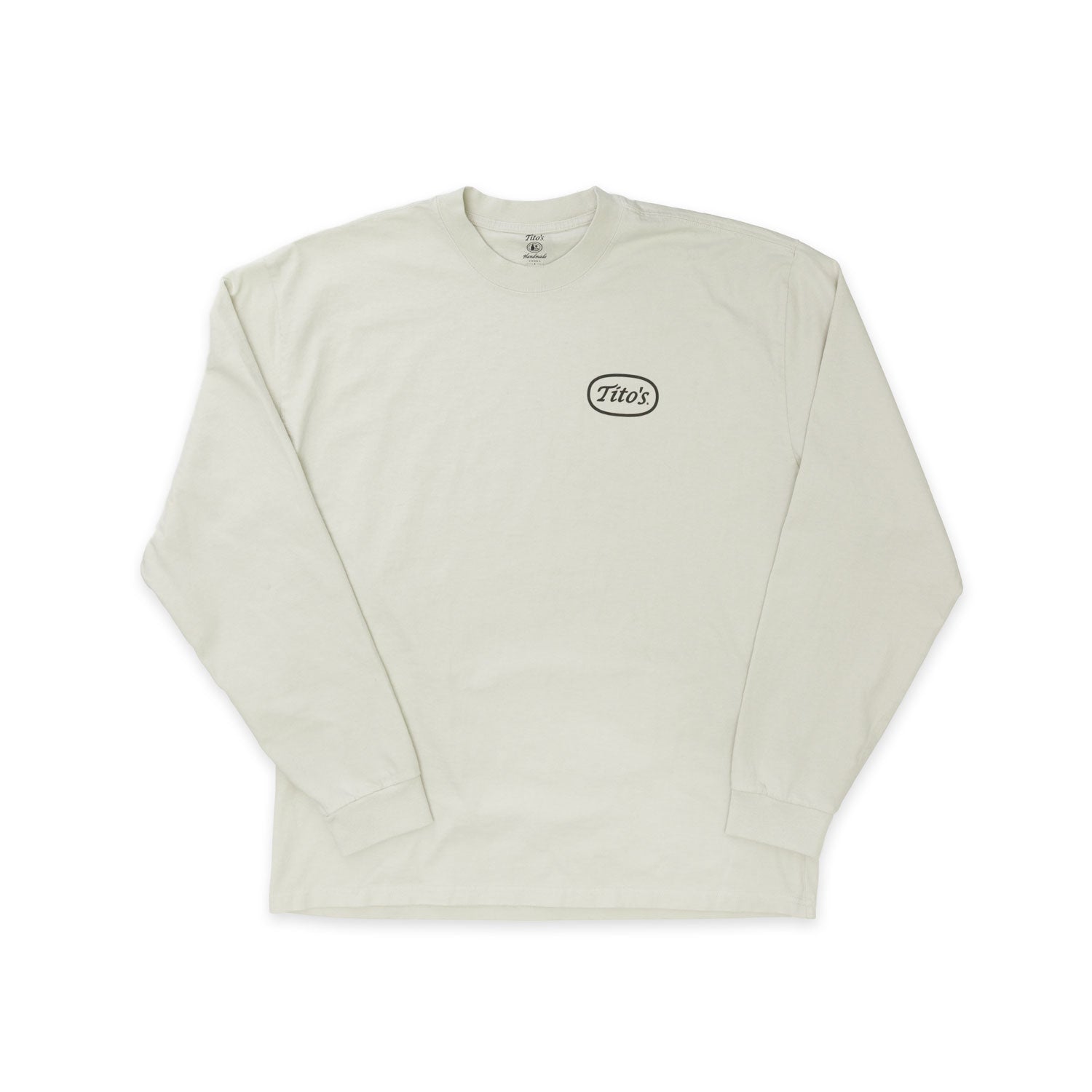 Front view of bone colored long sleeve with Tito's logo on the front chest