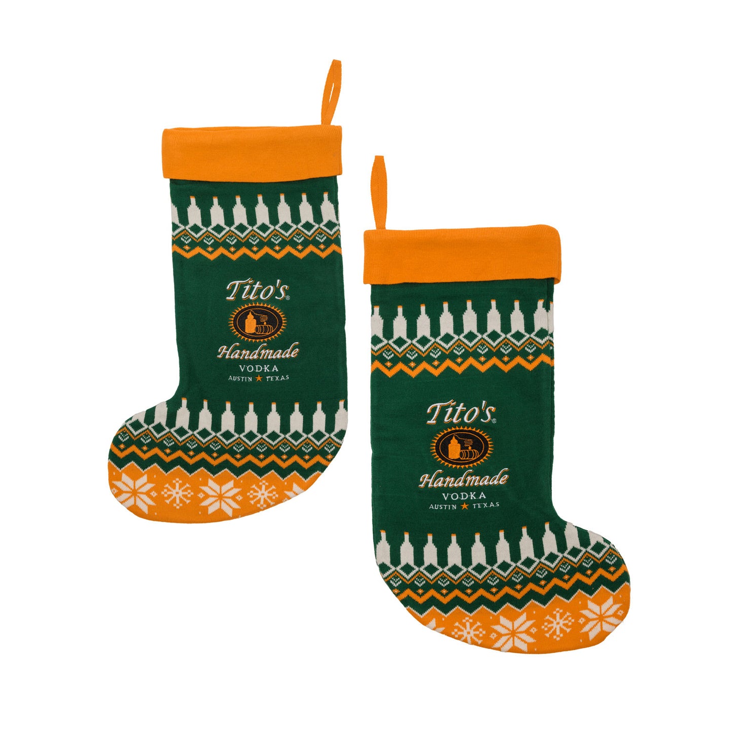 Two green and orange Tito's Handmade Vodka stockings with the same festive patterns on both sides. 
