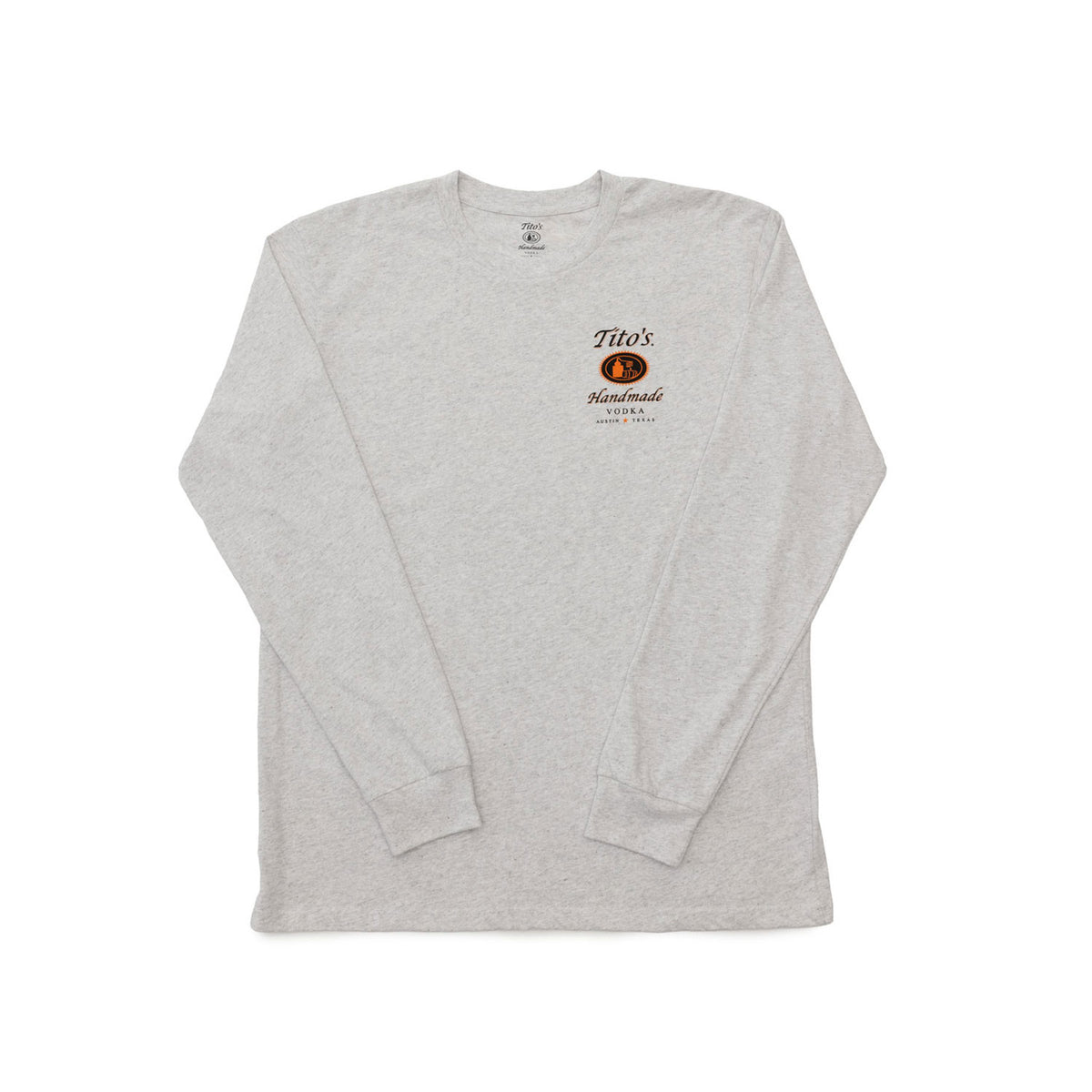 Front view of a heathered gray long sleeve shirt with the Tito's Handmade Vodka logo on the left chest in black and orange