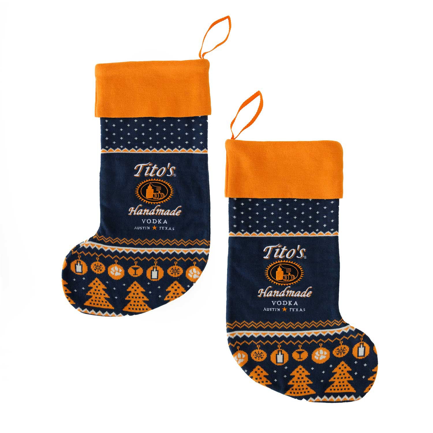 Front and back of navy, white, and orange stocking with Tito's Handmade Vodka logo, and designs of snowflakes, paw prints, trees, and martini glasses