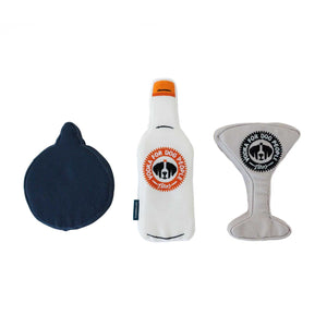 Back view of Tito's Vodka For Dog People Ornament squeeze toy, Tito's Bottle Toy, and Tito's Espresso Martini Puptail squeeze toy with Vodka for Dog People logo