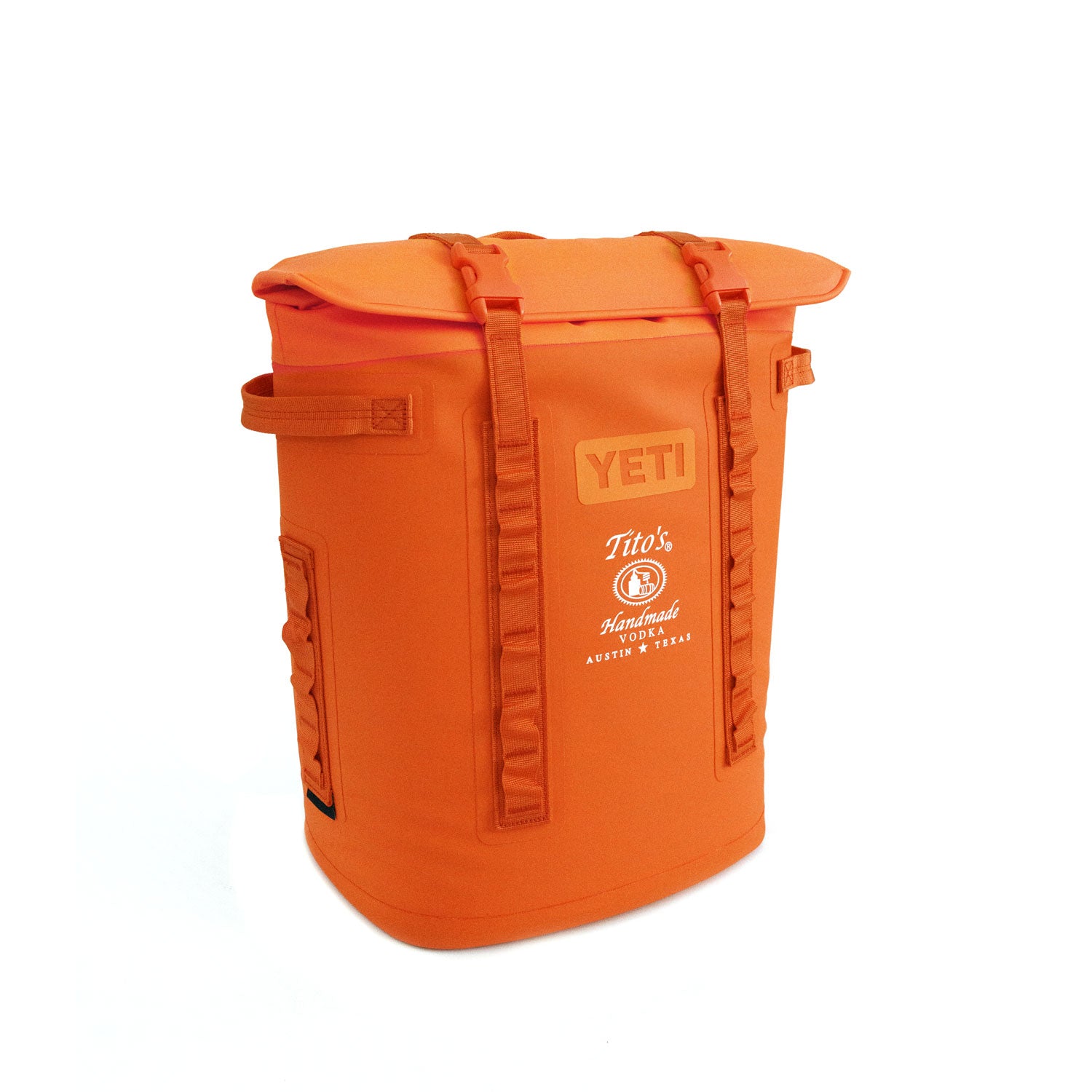 Front of Orange YETI Hopper® M20 Soft Cooler Backpack with Tito's Handmade Vodka logo
