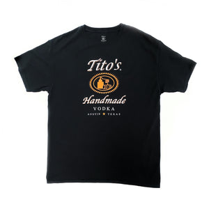 Front view of black short-sleeved t-shirt with large Tito's Handmade Vodka logo