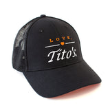 Front view of black trucker hat with embroidered Love, Tito's logo