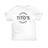 Back of white short-sleeved t-shirt with large design of Tito's Handmade Vodka, est. 1997, and Austin, TX