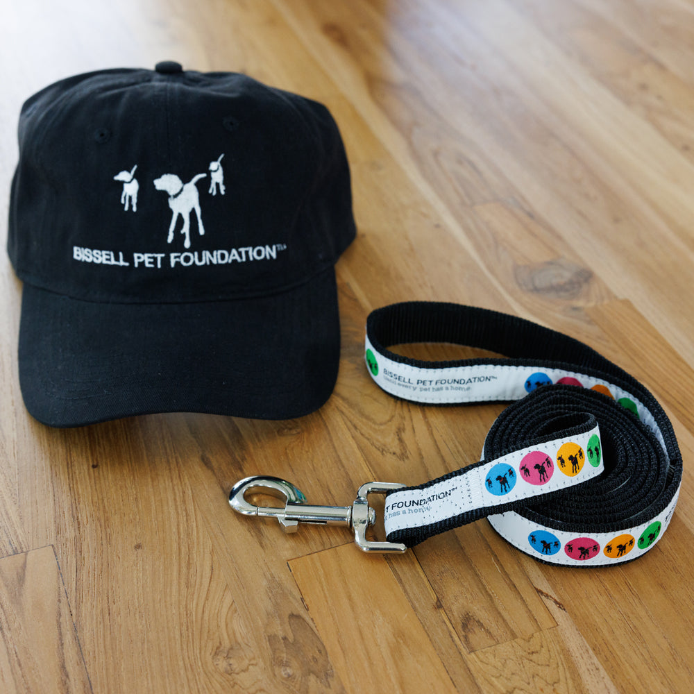 Black hat with BISSELL Pet Foundation logo and BISSELL Pet Foundation leash 