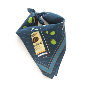 Navy silk scarf with illustrated Tito's Handmade Vodka bottles, martini glasses, and green olives