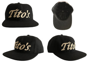 Black wool hat with Tito's wordmark appliqué in creamy white felt