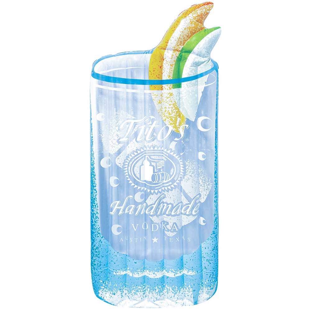 Blue pool float shaped like a cocktail with Tito's Handmade Vodka logo on the front