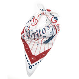 Folded red, white, and blue bandana with Tito's logo, pot stills, and the state of Texas details