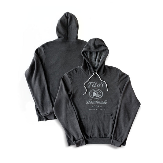 Front and back of charcoal gray hooded sweatshirt with pocket and white drawstring and white Tito's Handmade Vodka logo