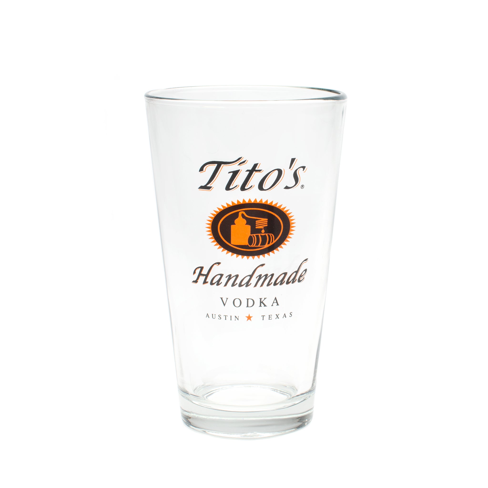 Pint glass with tito's handmade vodka logo on one side