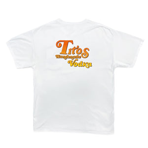 Back of white short-sleeved t-shirt with orange to yellow fade Tito's Handmade Vodka mark
