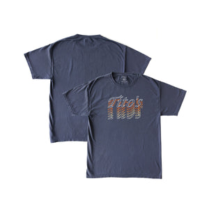 Front and back view of slate blue short-sleeved t-shirt with gradient Tito's wordmark on front and blank back