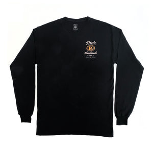 Front of black long-sleeved t-shirt with Tito's Handmade Vodka logo on left breast